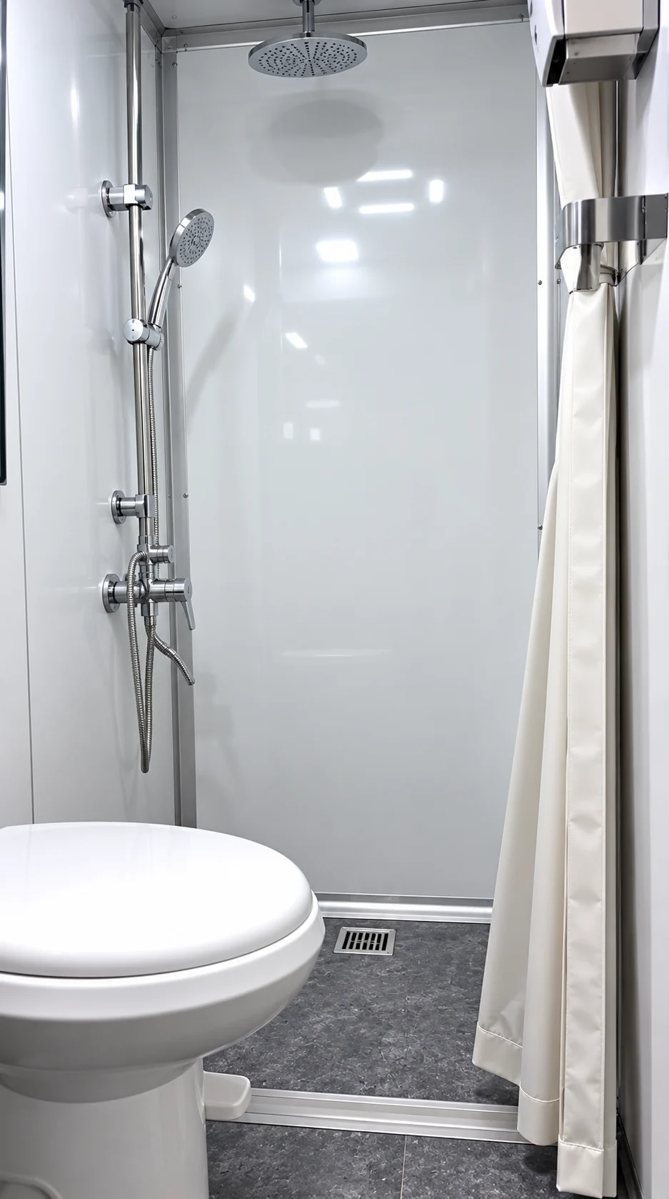 Shower and toilet inside the combination trailer